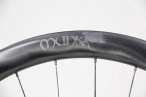 laser-etching-graphics-on-carbon-bike-wheels-custom-decals